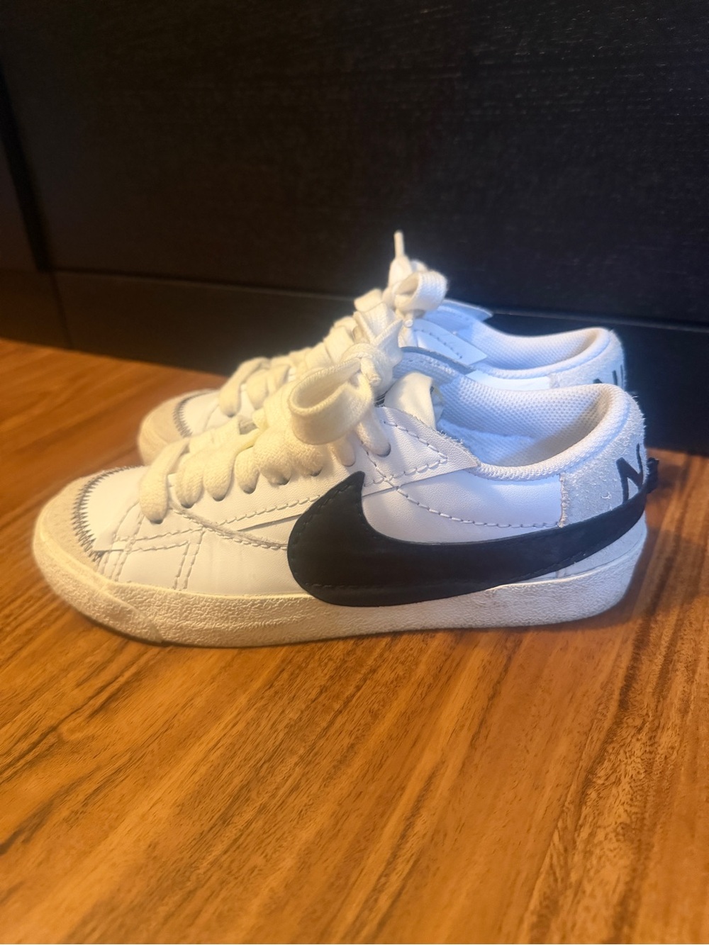 Nike White Sneakers with Black Swoosh